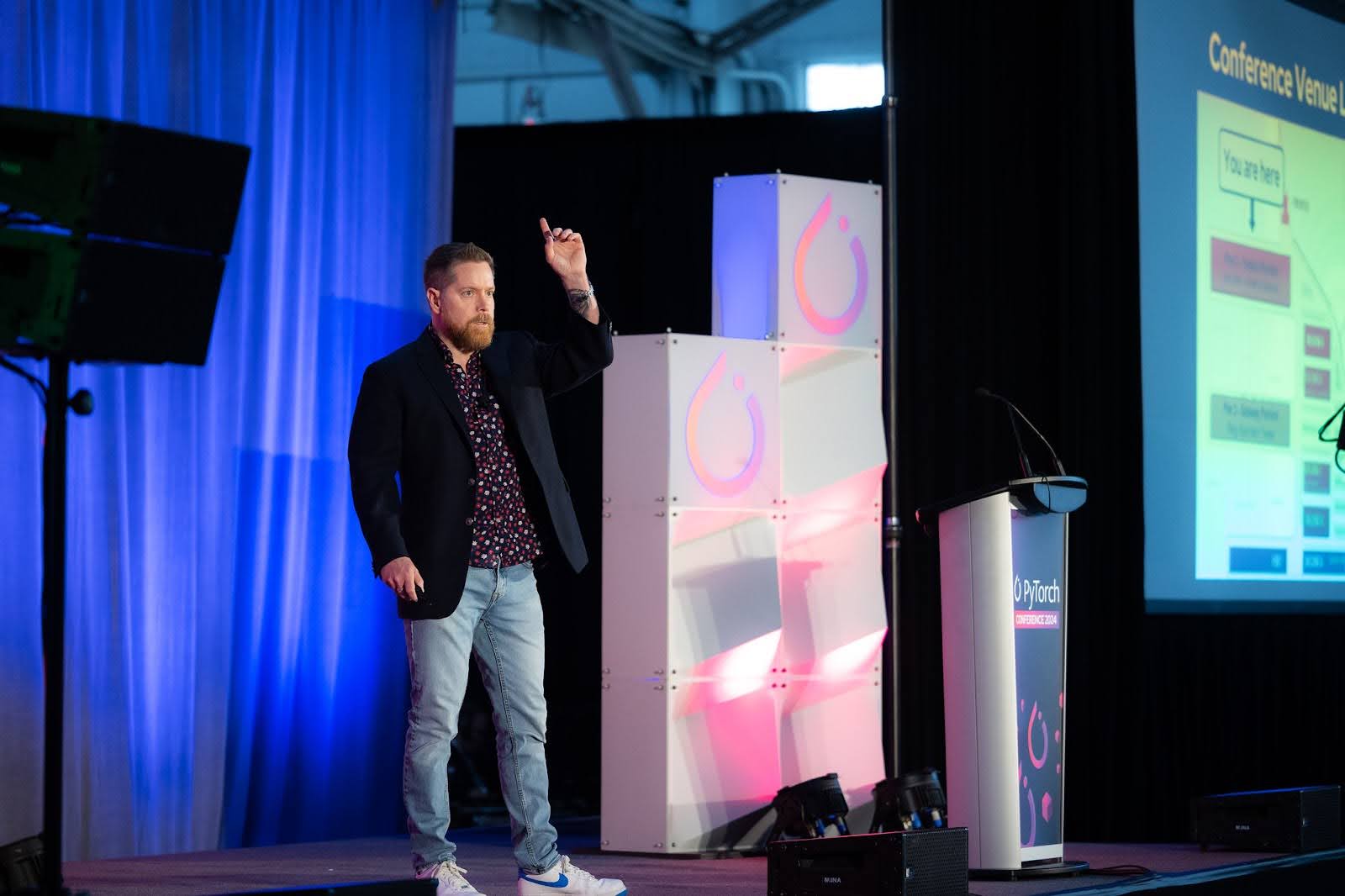 Matt speaking at a conference