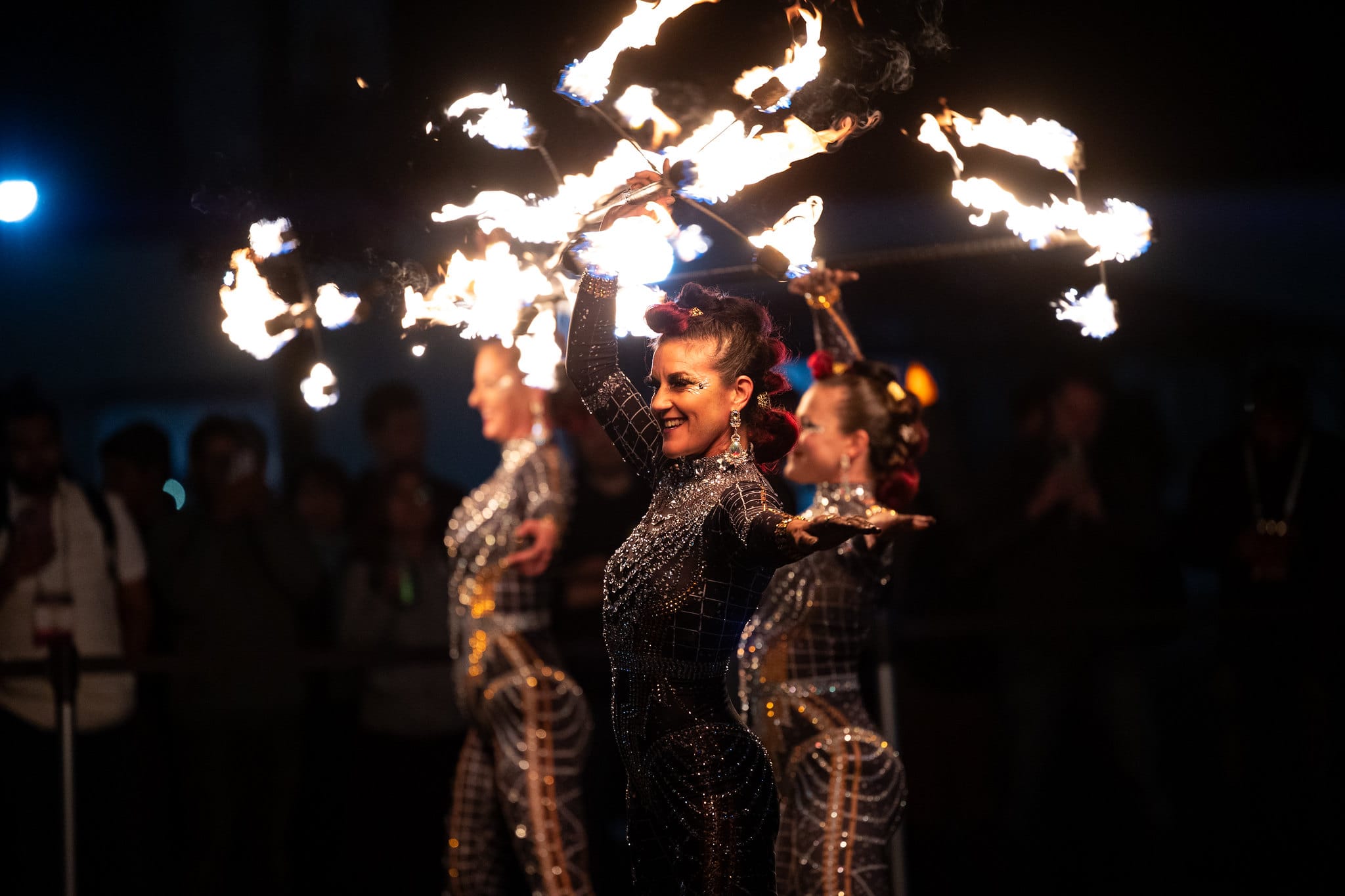 women dancing with fire